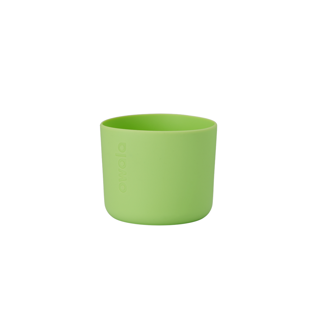 Owala Bottle Boot in bright lime green silicone with tonal Owala logo, short cylindrical form sized for 16oz Kids' FreeSip bottles